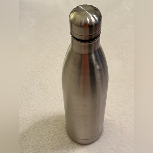Stash spot located in a stainless steels steel water bottle. - Picture 3 of 5